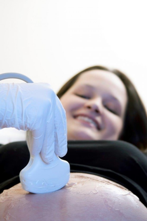 A woman undergoing a sonography.