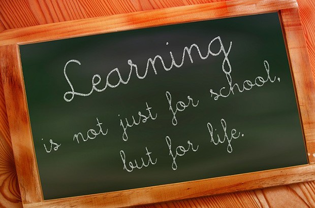 A chalkboard says learning is for life.