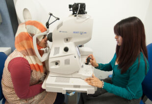 A woman undergoing diabetic eye screening.