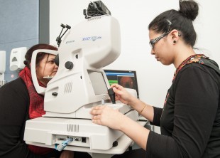 A woman undergoing diabetic eye screening.