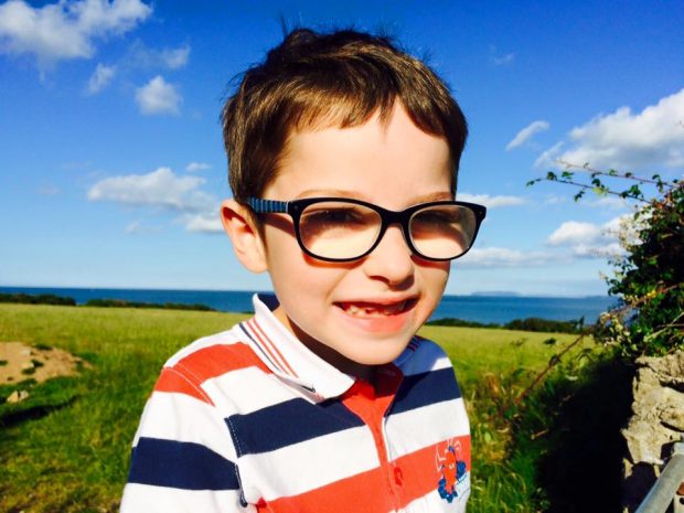 Cameron, aged 5, with his second pair of glasses.