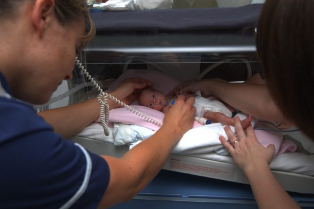 Baby in neonatal care unit