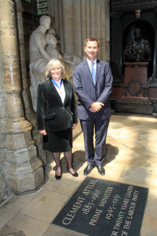 Belinda stood next to former health secretary Jeremy Hunt next to a stone for Clement Attlee.