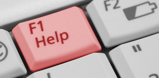 A red 'help' key on a keyboard