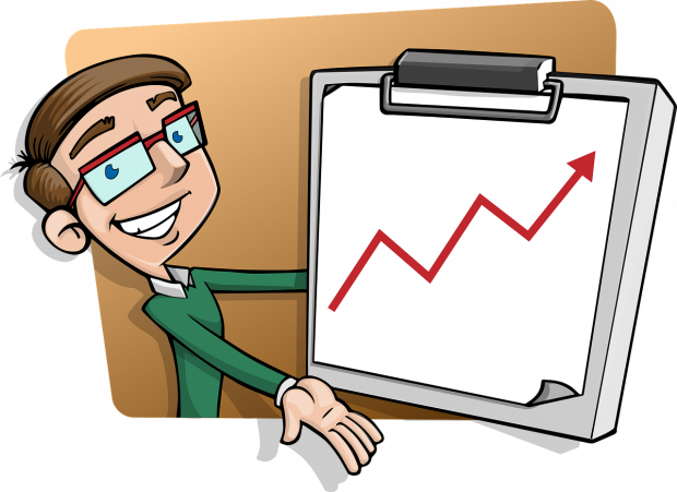 A man with glasses holds a chart which shows overall progress.