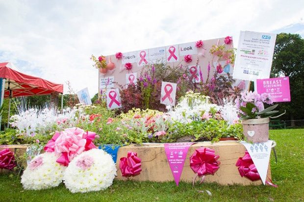 Raising awareness of breast screening through a very bright flower display and breast screening information and posters.