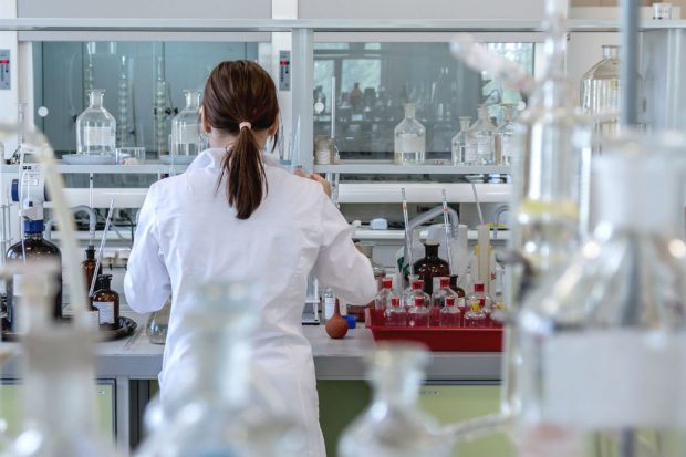 A woman doing tests in a laboratory